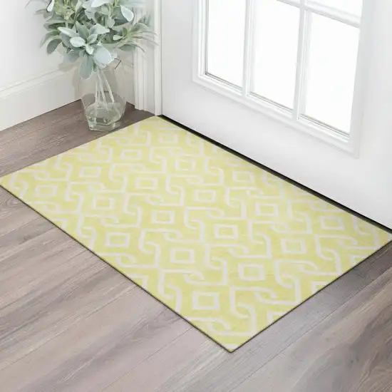 Yellow And Ivory Geometric Washable Area Rug With UV Protection Photo 1