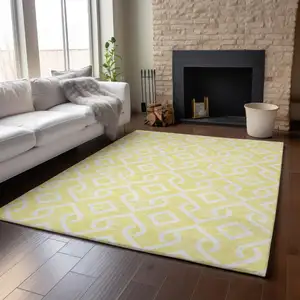 Photo of Yellow And Ivory Geometric Washable Area Rug With UV Protection