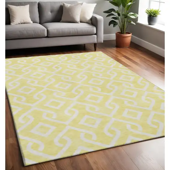 Yellow And Ivory Geometric Washable Area Rug With UV Protection Photo 2
