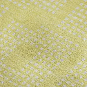 Photo of Yellow And Ivory Geometric Washable Area Rug With UV Protection