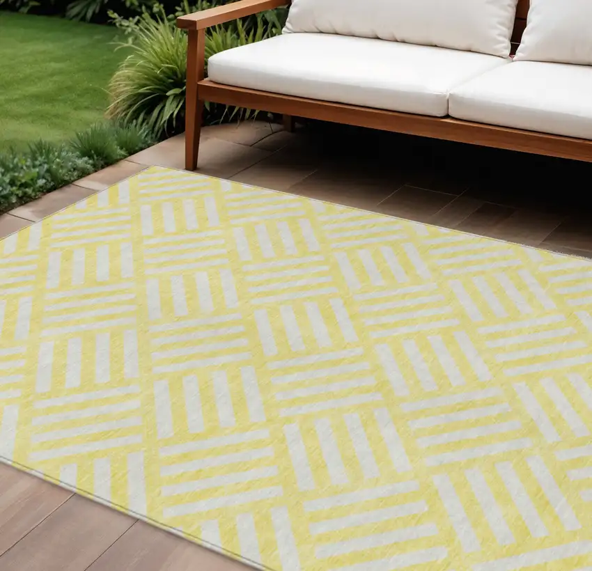 Yellow And Ivory Geometric Washable Indoor Outdoor Area Rug Photo 1