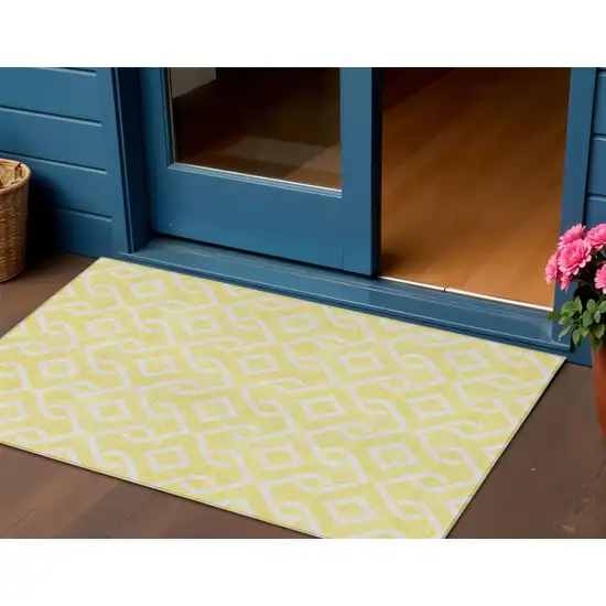 Yellow And Ivory Geometric Washable Indoor Outdoor Area Rug Photo 2