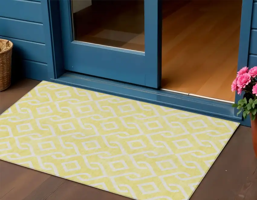 Yellow And Ivory Geometric Washable Indoor Outdoor Area Rug Photo 2