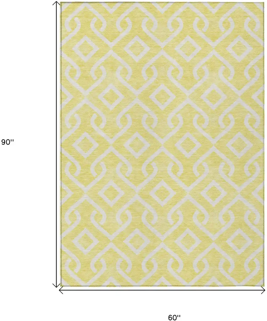 Yellow And Ivory Geometric Washable Indoor Outdoor Area Rug Photo 6