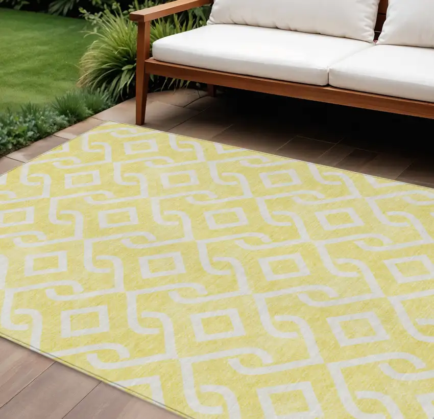 Yellow And Ivory Geometric Washable Indoor Outdoor Area Rug Photo 1