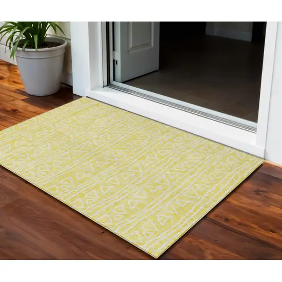 Yellow And Ivory Geometric Washable Indoor Outdoor Area Rug Photo 1