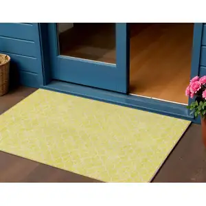 Photo of Yellow And Ivory Geometric Washable Indoor Outdoor Area Rug