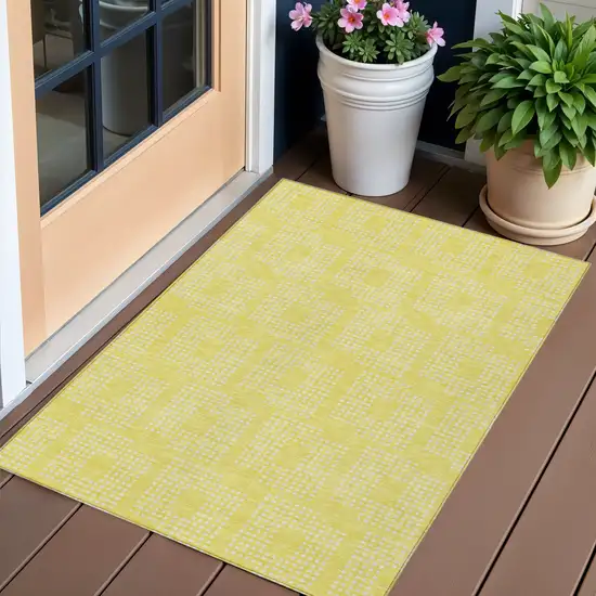 Yellow And Ivory Geometric Washable Indoor Outdoor Area Rug Photo 1
