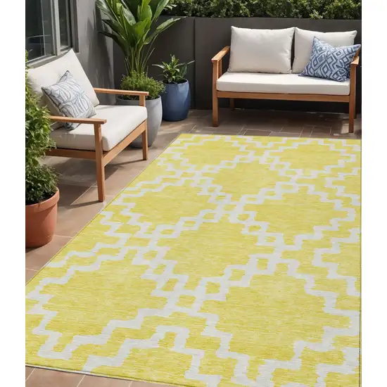 Yellow And Ivory Geometric Washable Indoor Outdoor Area Rug Photo 1