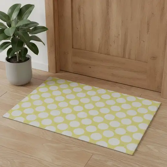 Yellow And Ivory Polka Dot Washable Area Rug With UV Protection Photo 1