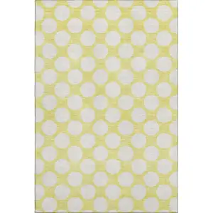 Photo of Yellow And Ivory Polka Dot Washable Area Rug With UV Protection