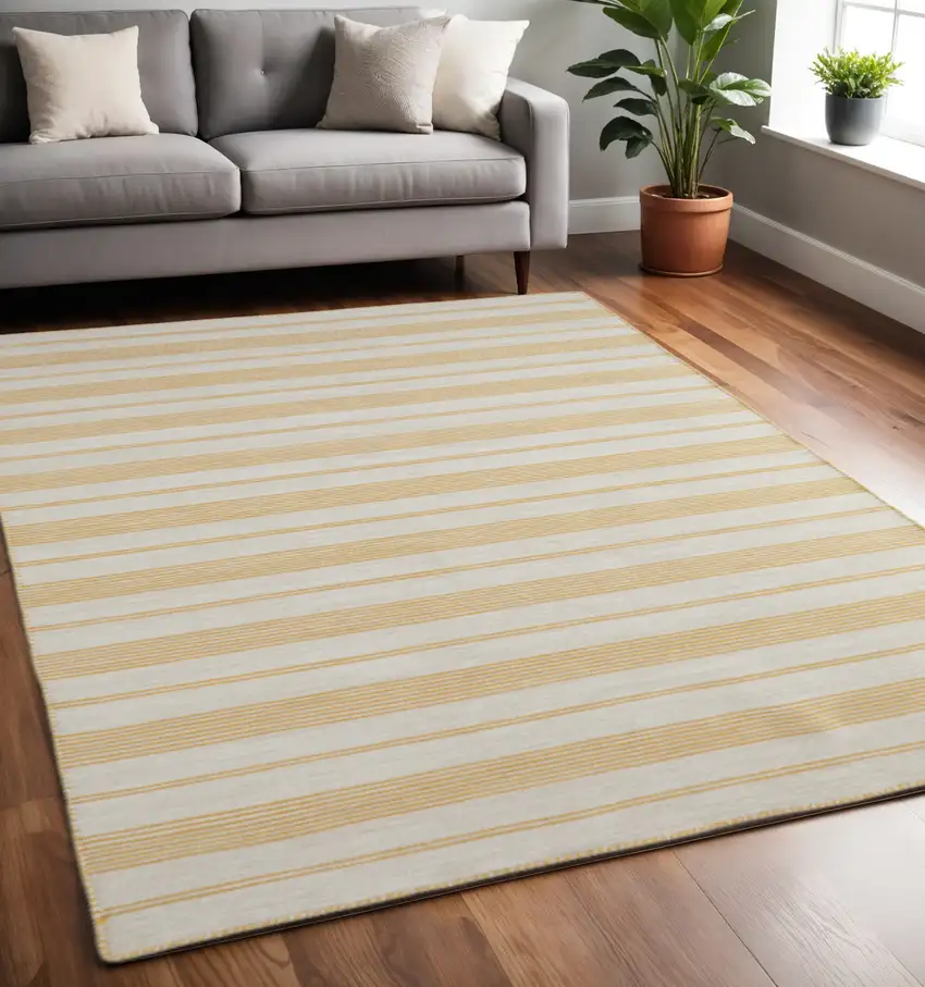 Yellow And Ivory Striped Dhurrie Hand Woven Stain Resistant Area Rug Photo 1