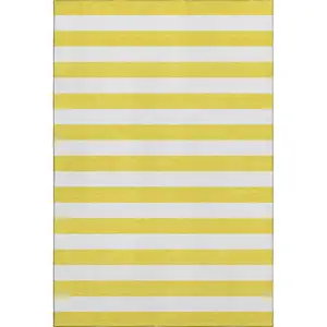Photo of Yellow And Ivory Striped Washable Area Rug With UV Protection