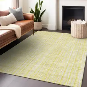 Photo of Yellow And Ivory Striped Washable Area Rug With UV Protection