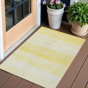 Photo of Yellow And Ivory Striped Washable Indoor Outdoor Area Rug