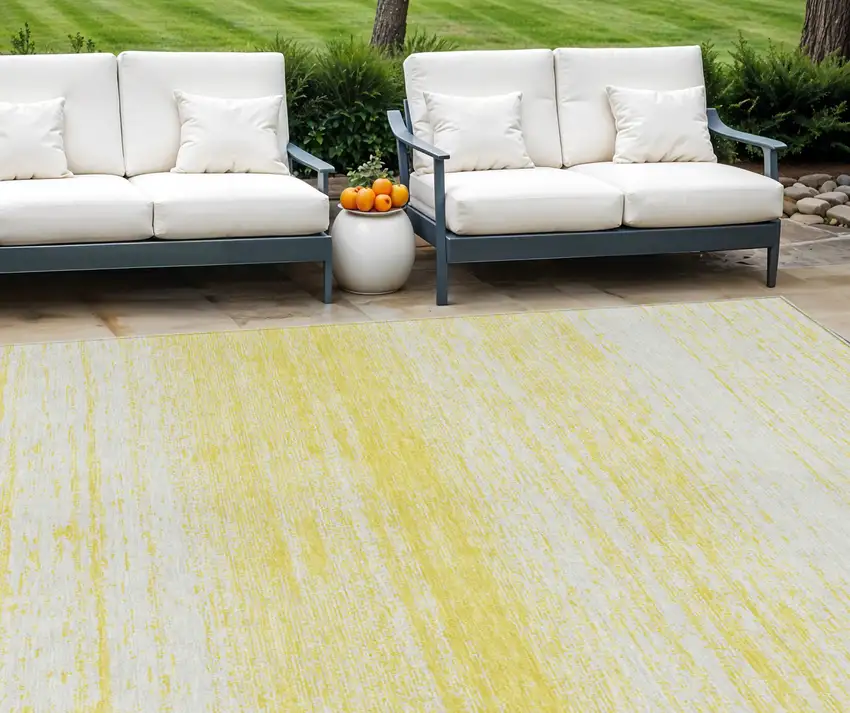 Yellow And Ivory Striped Washable Indoor Outdoor Area Rug Photo 1