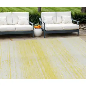 Photo of Yellow And Ivory Striped Washable Indoor Outdoor Area Rug