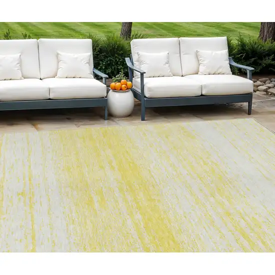 Yellow And Ivory Striped Washable Indoor Outdoor Area Rug Photo 1