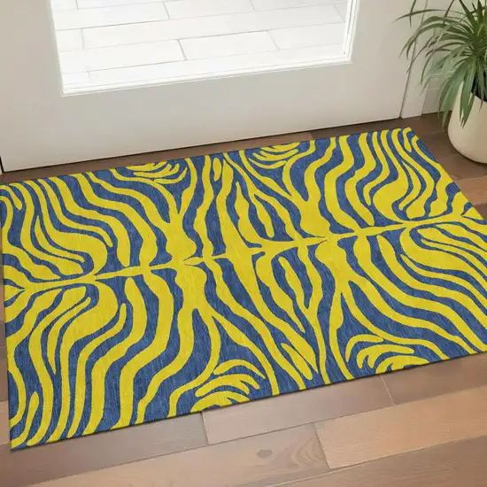 Yellow And Navy Blue Animal Print Washable Area Rug With UV Protection Photo 1