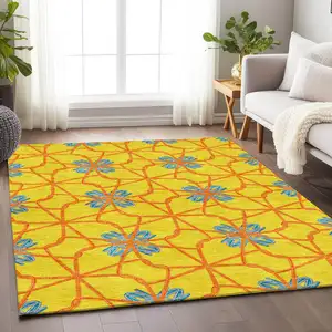 Photo of Yellow Blue And Red Geometric Washable Area Rug With UV Protection