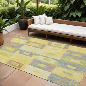 Photo of Yellow Blue And Terra Cotta Geometric Washable Indoor Outdoor Area Rug