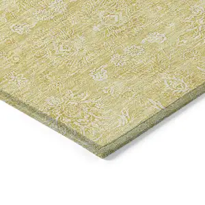 Photo of Yellow Gold And Ivory Floral Washable Indoor Outdoor Area Rug