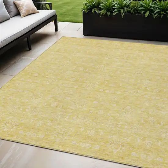 Yellow Gold And Ivory Floral Washable Indoor Outdoor Area Rug Photo 1