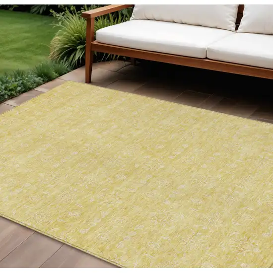Yellow Gold And Ivory Floral Washable Indoor Outdoor Area Rug Photo 1