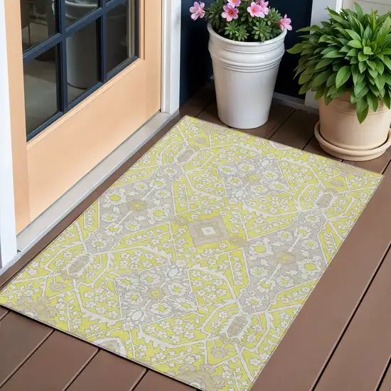 Yellow Ivory And Beige Floral Washable Indoor Outdoor Area Rug Photo 1