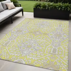 Photo of Yellow Ivory And Beige Floral Washable Indoor Outdoor Area Rug