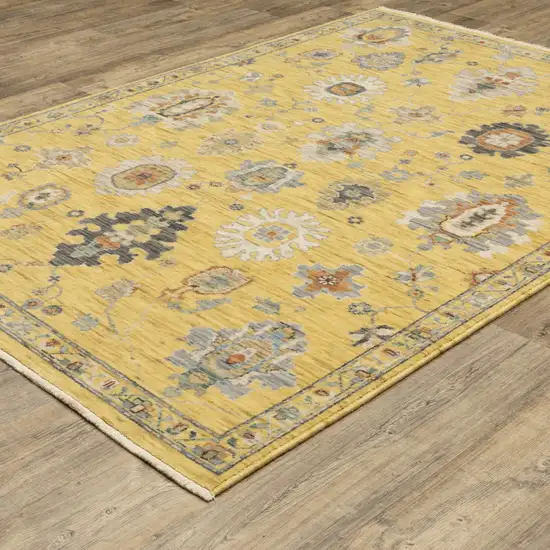 Yellow Ivory And Black Oriental Area Rug With Fringe Photo 9