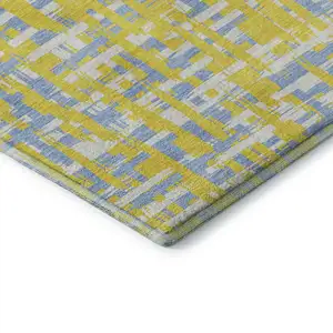 Photo of Yellow Ivory And Denim Blue Abstract Geometric Washable Area Rug With UV Protection