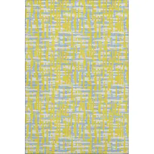 Photo of Yellow Ivory And Denim Blue Abstract Geometric Washable Area Rug With UV Protection