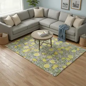 Photo of Yellow Ivory And Green Botanical Leaves Washable Area Rug With UV Protection