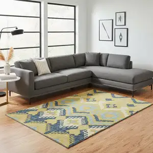 Photo of Yellow Ivory And Navy Blue Tribal Washable Area Rug With UV Protection