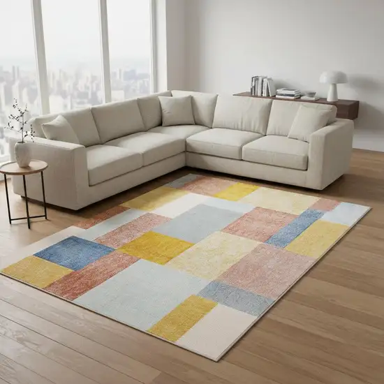 Yellow Orange And Blue Geometric Area Rug Photo 1
