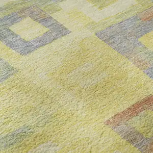 Photo of Yellow Orange Purple And Ivory Geometric Washable Area Rug With UV Protection