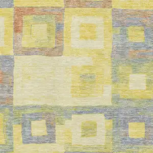 Photo of Yellow Orange Purple And Ivory Geometric Washable Area Rug With UV Protection