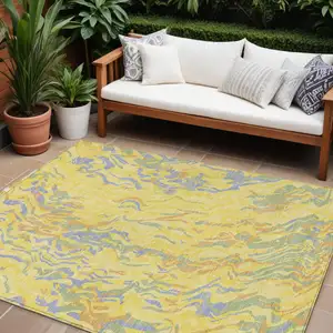 Photo of Yellow Purple And Green Abstract Washable Indoor Outdoor Area Rug