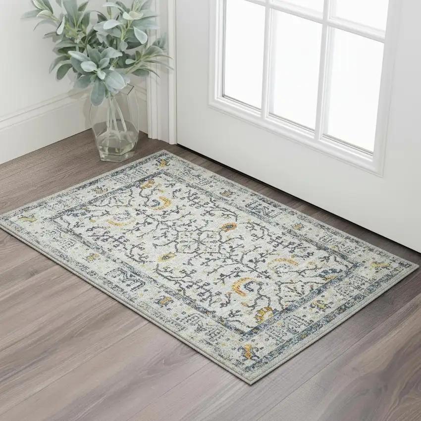 Ivory And Yellow Oriental Distressed Area Rug Photo 1