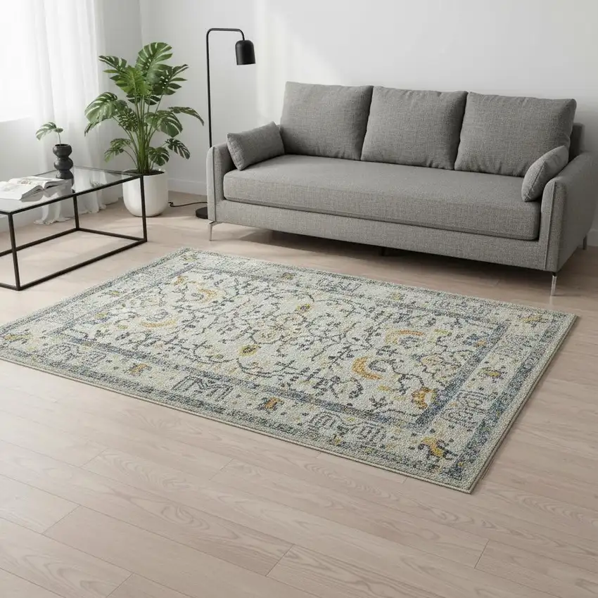 Ivory And Yellow Oriental Distressed Area Rug Photo 1